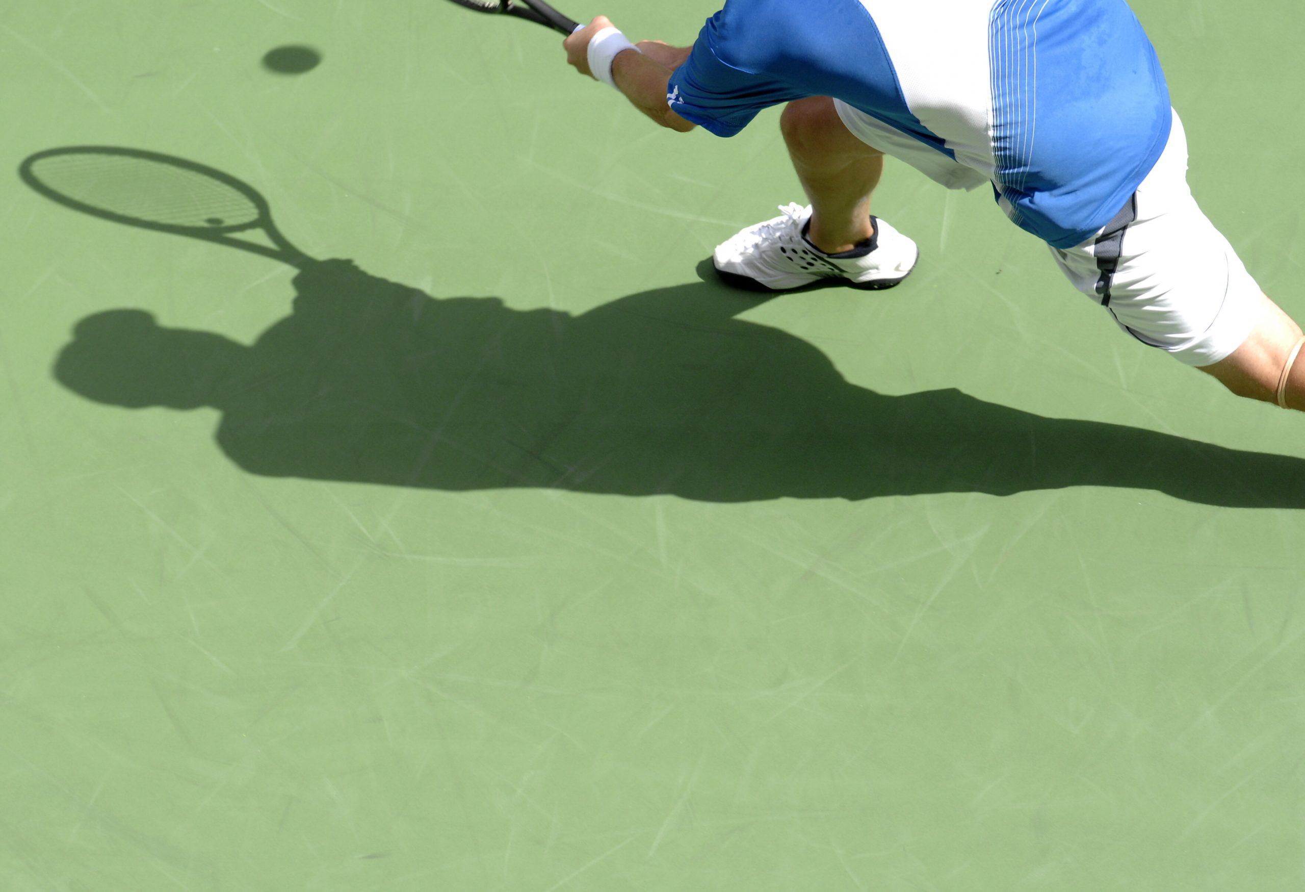 Tennis shadow 21 Tennis player on court